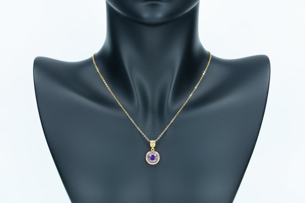 Amethyst solitaire pendant necklace made from 18K gold-plated stainless steel.