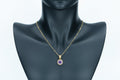 Amethyst solitaire pendant necklace made from 18K gold-plated stainless steel.