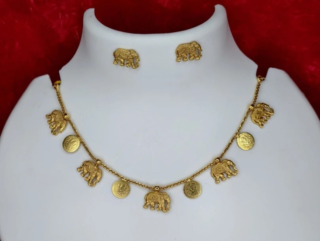 Product Title: "Divine Heritage" Artisan Gold Elephant Charm Necklace and Earring Set